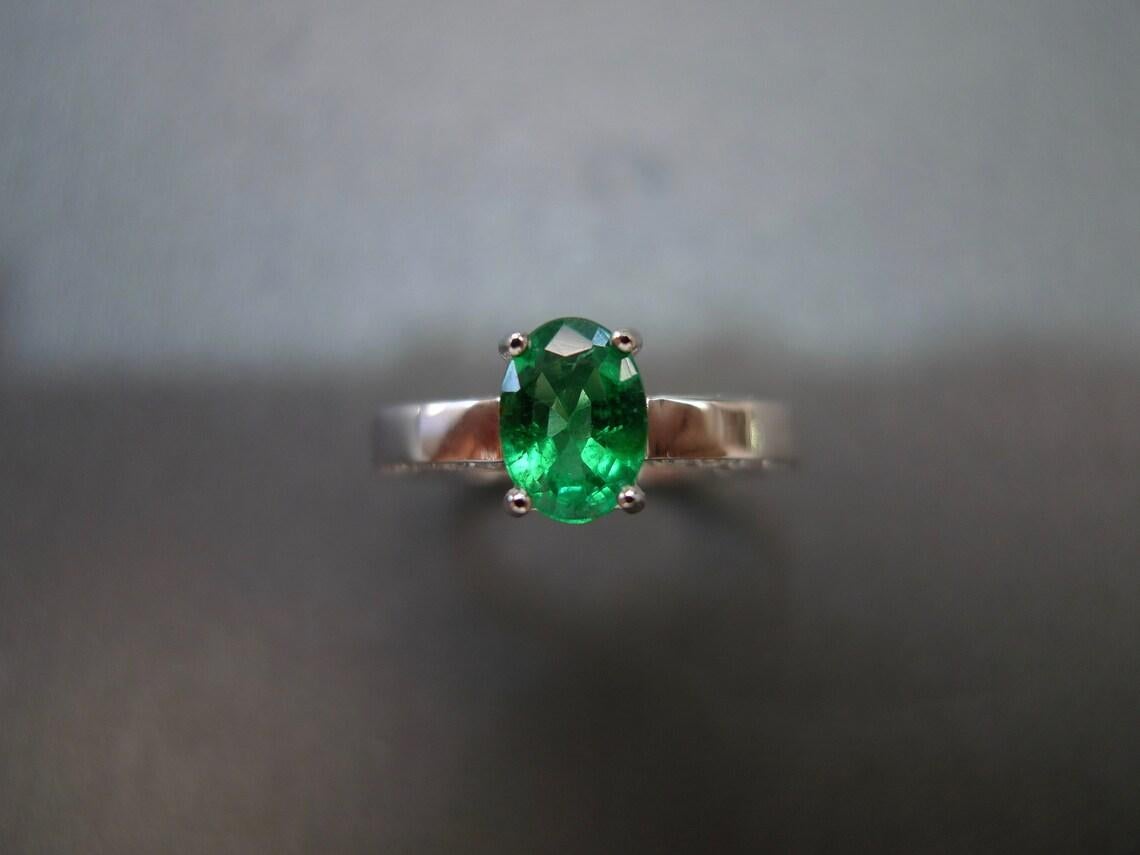 For Sale:  Oval Cut Natural Emerald and Round Brilliant Cut Diamond Engagement Ring 5