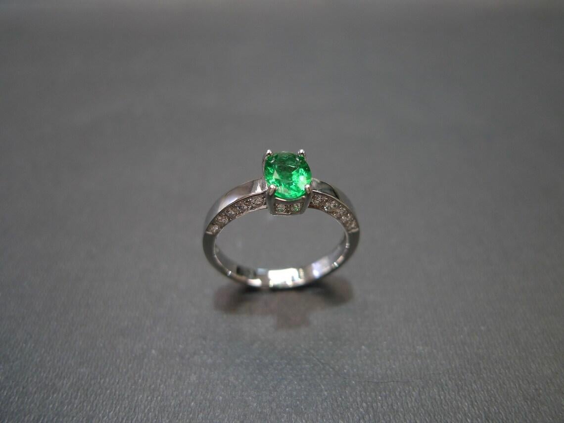 For Sale:  Oval Cut Natural Emerald and Round Brilliant Cut Diamond Engagement Ring 6