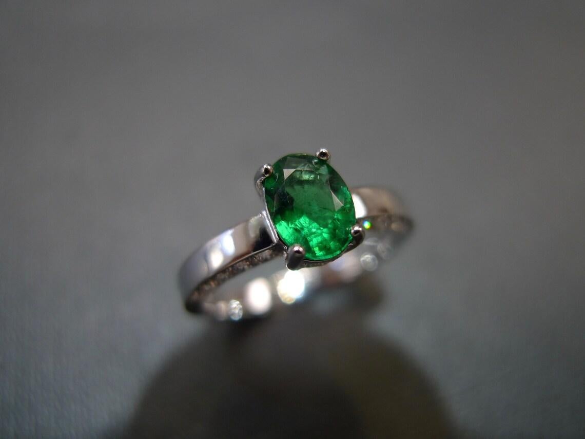 For Sale:  Oval Cut Natural Emerald and Round Brilliant Cut Diamond Engagement Ring 8