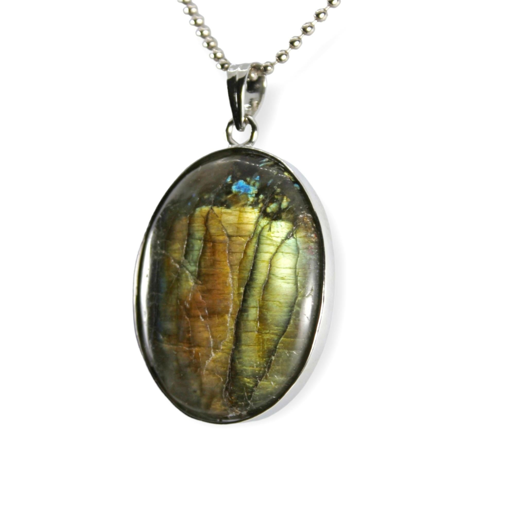 Product specifications :

Gemstone - Natural Labradorite 
Carat weight - 90.45 Carat
Total piece weight - 21.72 grams
Metal - sterling silver
Metal weight - 3.6 grams
Pendant dimensions - 53 x 32 x 4 mm

This stunning green labradorite pendant is