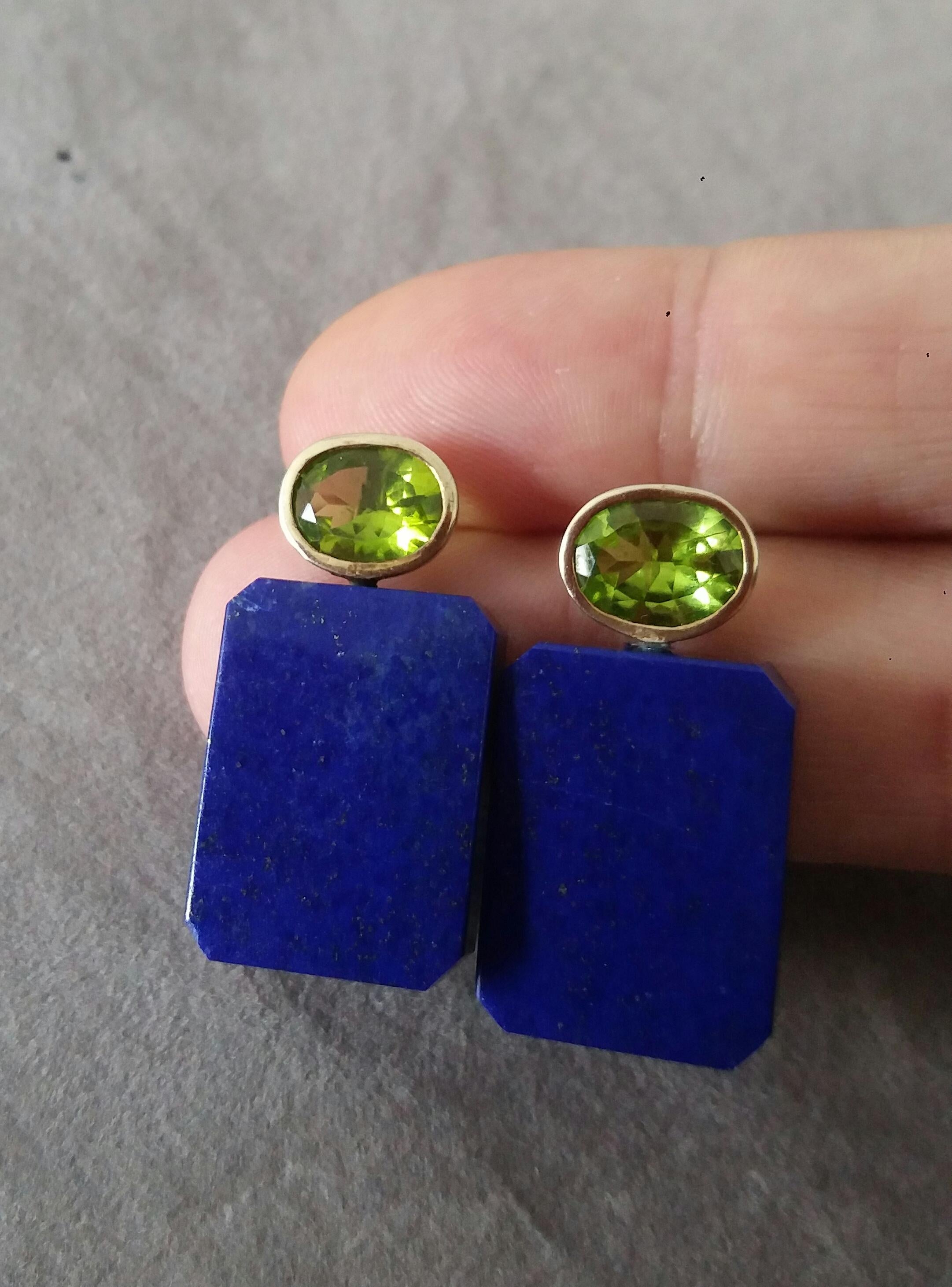 Simple chic stud earrings with a pair of Oval Cut Peridots measuring 8mm x10 mm set in solid 14 Kt. yellow gold on the top and in the lower parts 2 Octagon Shape Genuine Lapis Lazuli  measuring 17x22 mm.
In 1978 our workshop started in Italy to make