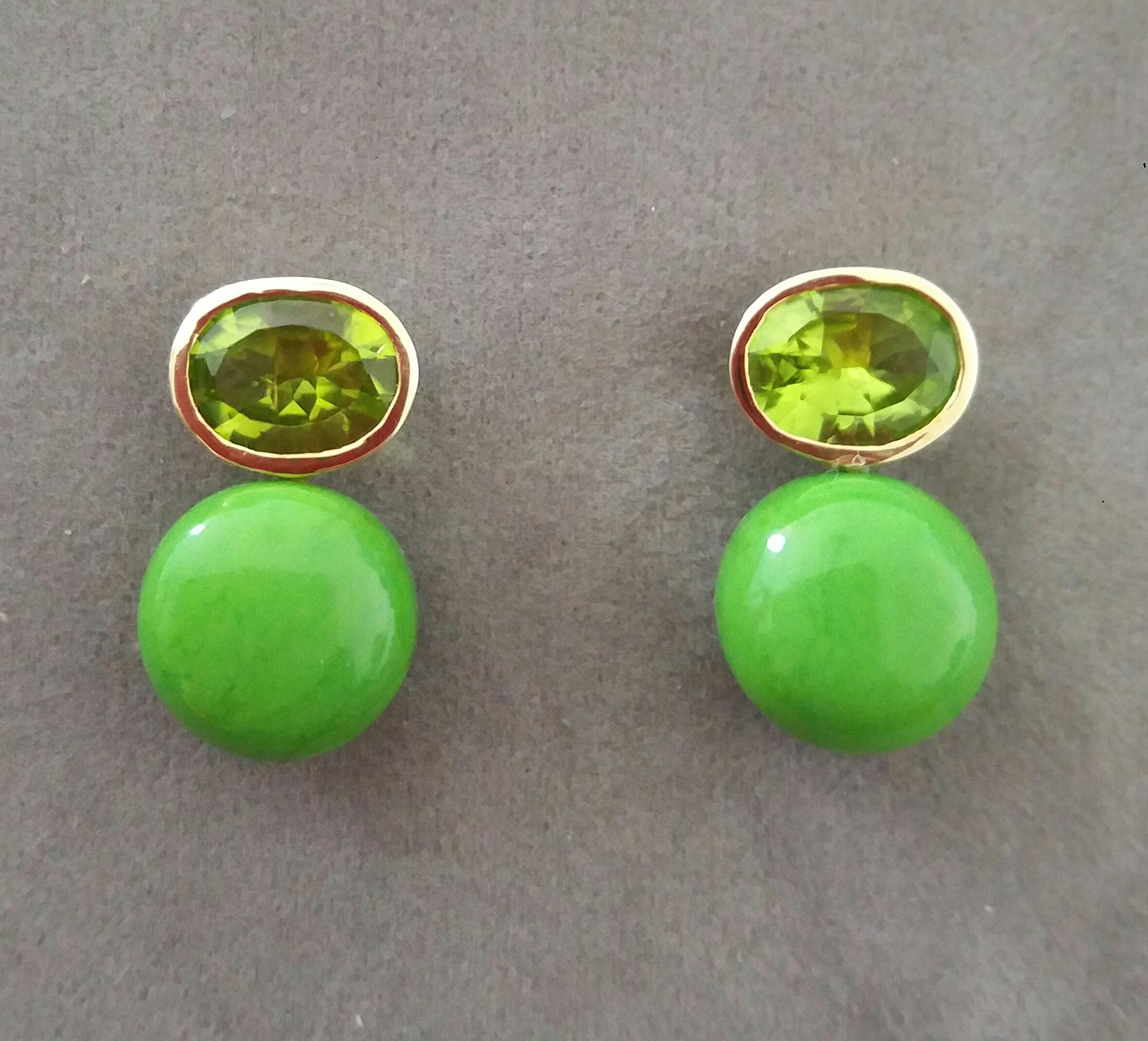 Simple chic stud earrings with a pair of Oval Cut Peridots measuring 8mm x10 mm set in solid 14 Kt. yellow gold on the top and in the lower parts 2 Turkmenistan Green Turquoise round buttons of 12 mm in diameter.

In 1978 our workshop started in