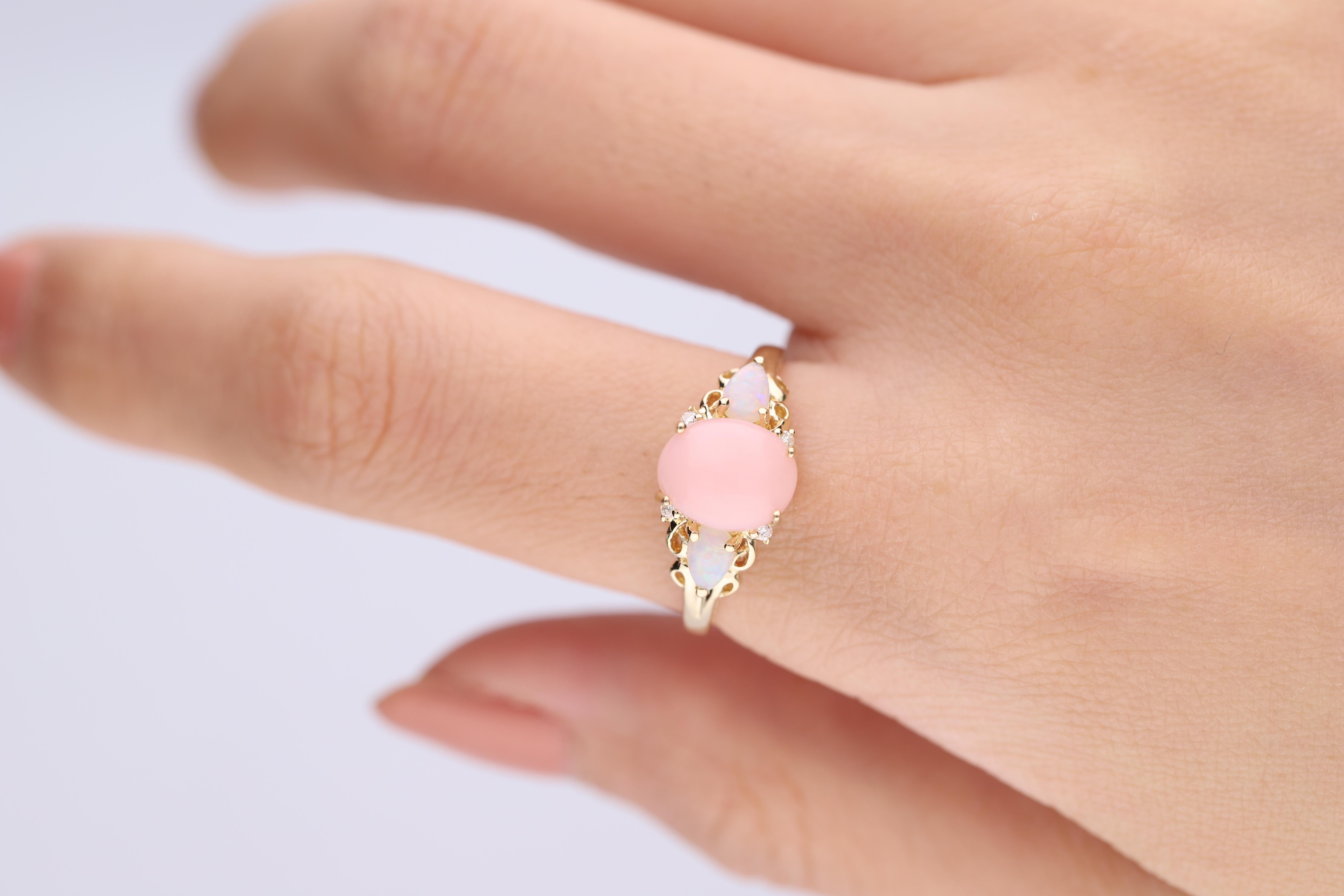 Stunning, timeless and classy eternity Unique Ring. Decorate yourself in luxury with this Gin & Grace Ring. The 10K Yellow Gold jewelry boasts Oval-Cut Prong Setting Natural Opal (3 pcs) 1.91 Carat, along with Natural Round cut white Diamond (4 Pcs)