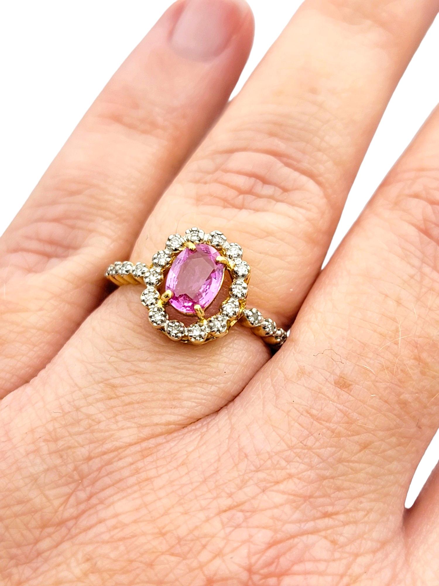 Oval Cut Pink Sapphire Ring with Floating Diamond Halo in 18 Karat Yellow Gold  For Sale 4