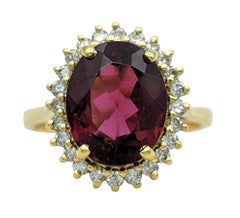 Oval Cut Dark Pink Tourmaline & Diamond Halo Cocktail Ring 18 Karat Yellow Gold