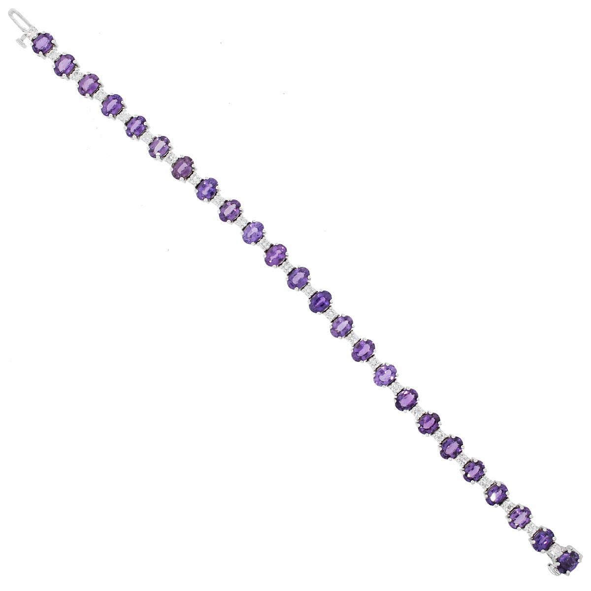 Material: 18k white gold
Diamond Details: Approximately 1.52ctw of round brilliant diamonds. Diamonds are G/H in color and VS in clarity.
Gemstone Details: Approximately 15.50ctw of oval cut purple sapphire gemstones.
Clasp: Tongue in box