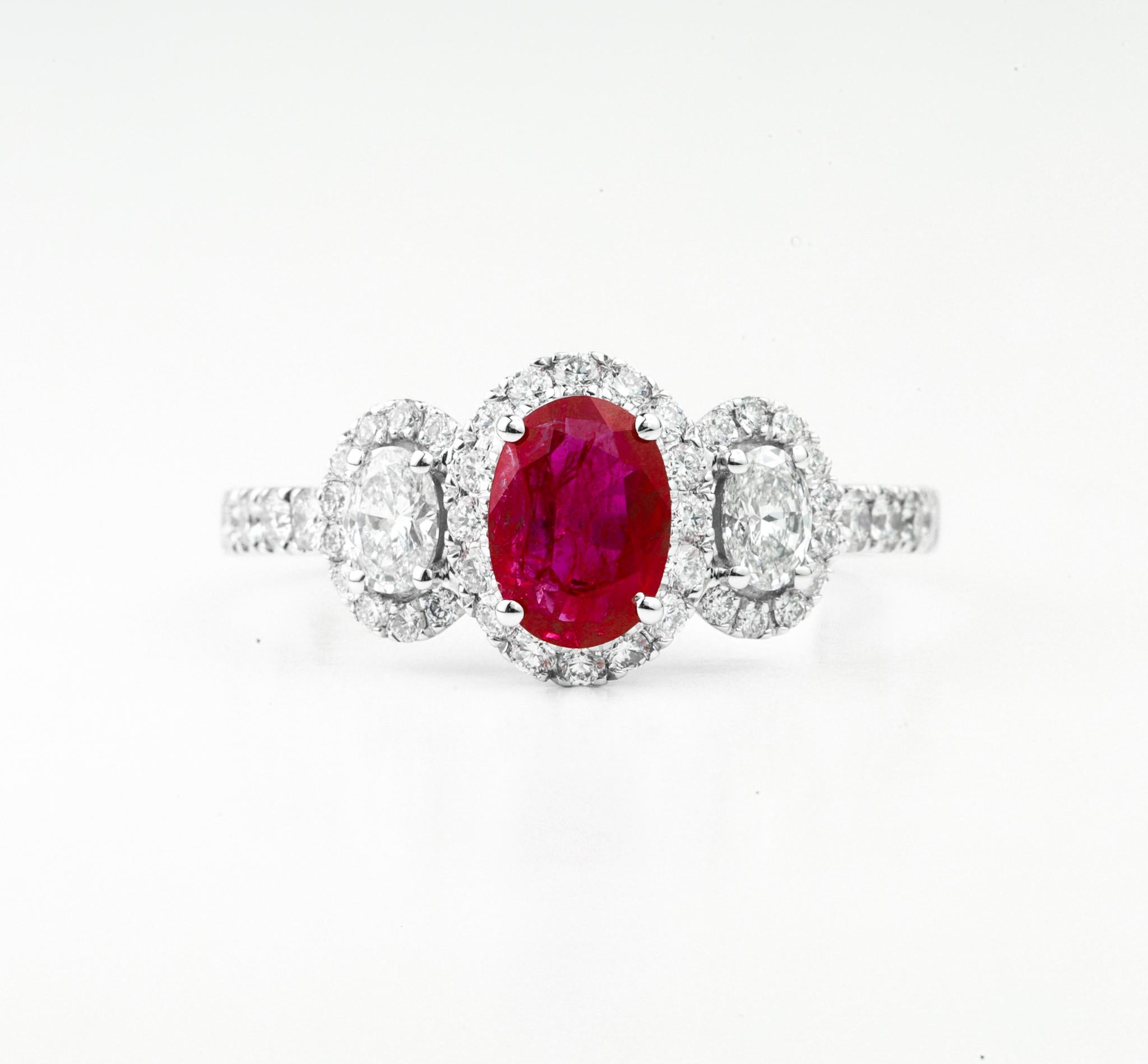 Oval Cut Red Ruby Diamond Three Stone Halo Engagement Ring in 18k White Gold

Available in 18k white gold.

Same design can be made also with other custom gemstones per request.

Product details:

- Solid gold

- Diamond - approx. 0.73 carat

- Ruby