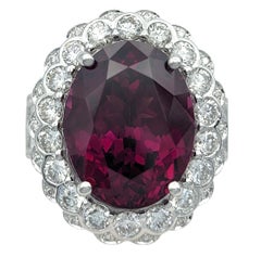 Oval Cut Rhodolite Garnet and Diamond Halo Cocktail Ring in 14 Karat White Gold