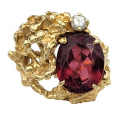 Oval Cut Rubellite Tourmaline Cocktail Ring with Diamond in 14 Karat Yellow Gold