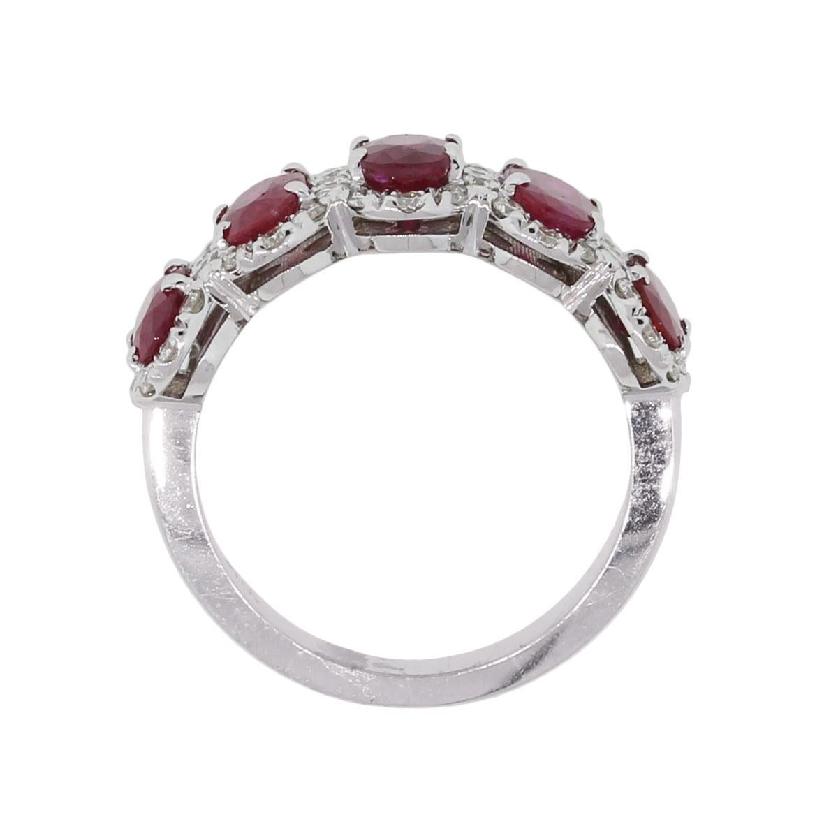 Material: 18k white gold
Diamonds Details: Approximately 0.53ctw of round brilliant diamonds. Diamonds are G/H in color and VS in clarity.
Gemstone Details: Approximately 2.90ctw of oval shape ruby gemstones.
Ring Measurements: 0.89″ x 0.34″ x