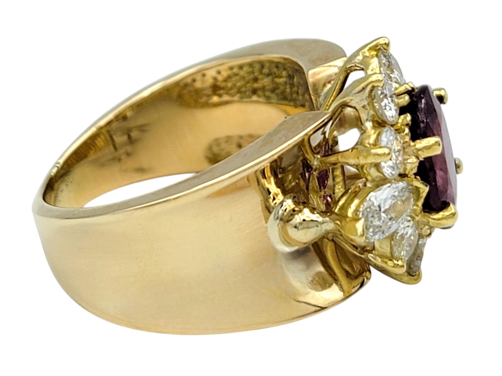 Oval Cut Ruby and Diamond Halo Wide Band Ring in Polished 14 Karat Yellow Gold In Good Condition For Sale In Scottsdale, AZ