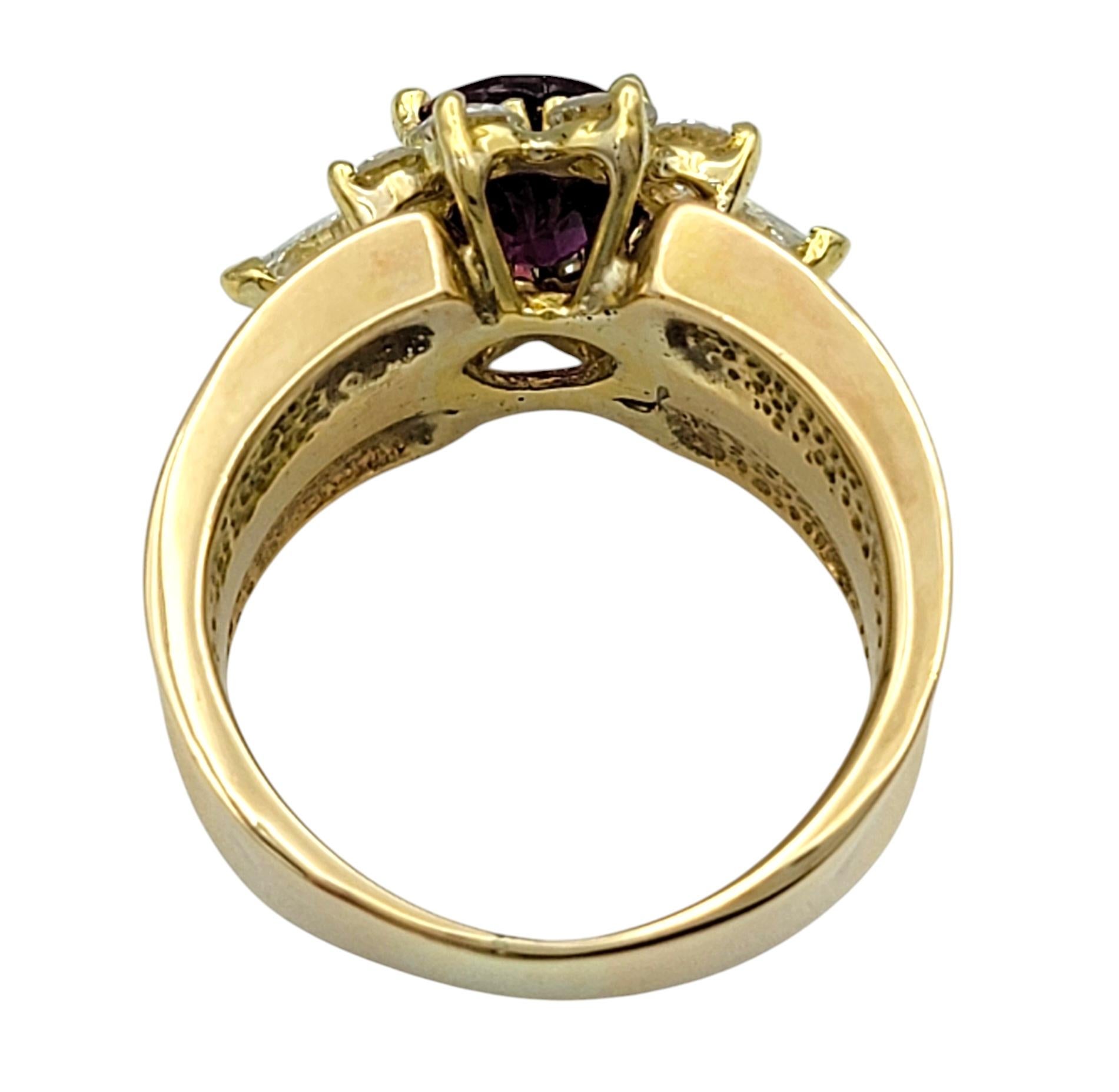 Oval Cut Ruby and Diamond Halo Wide Band Ring in Polished 14 Karat Yellow Gold For Sale 1
