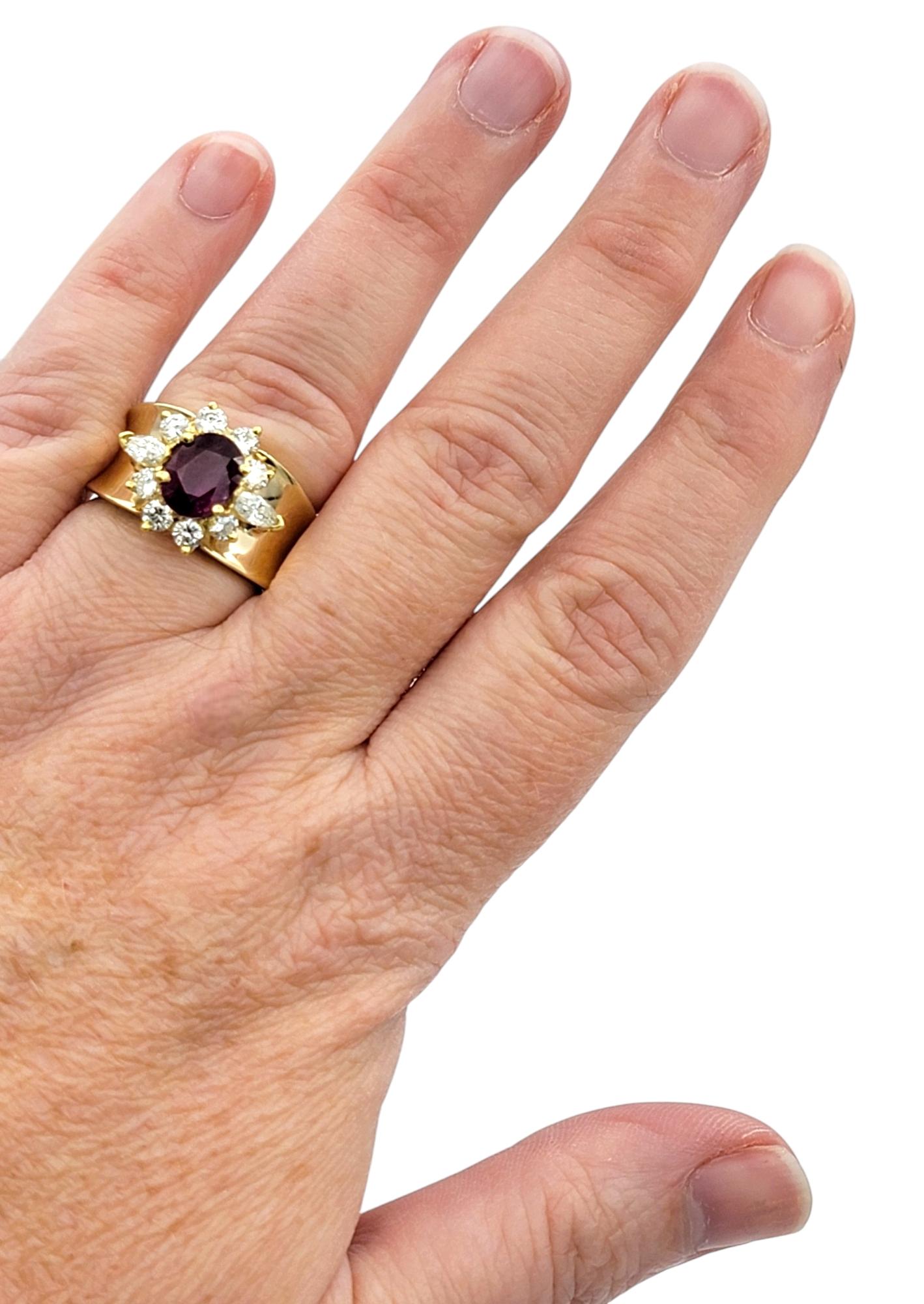 Oval Cut Ruby and Diamond Halo Wide Band Ring in Polished 14 Karat Yellow Gold For Sale 3