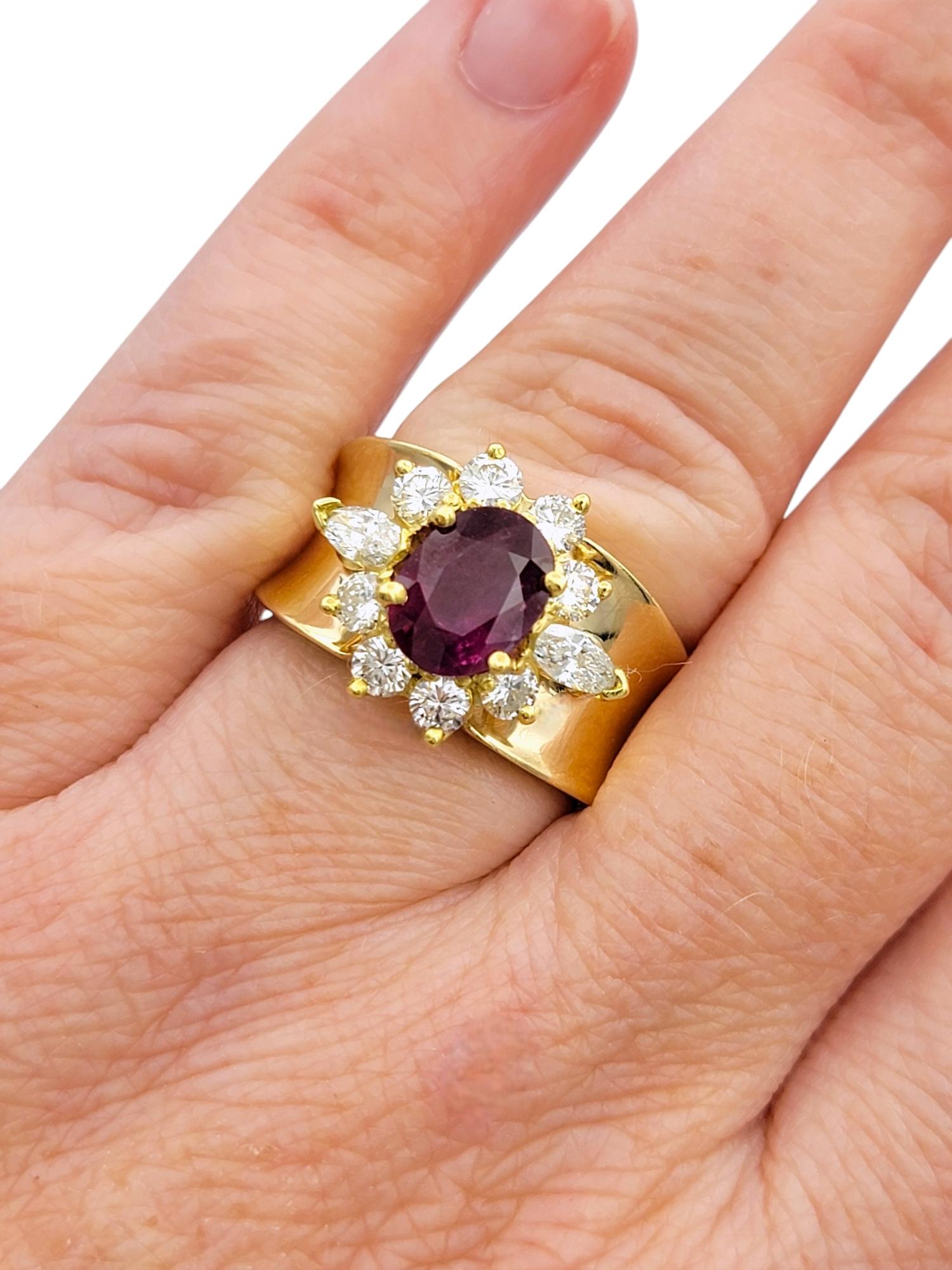 Oval Cut Ruby and Diamond Halo Wide Band Ring in Polished 14 Karat Yellow Gold For Sale 4