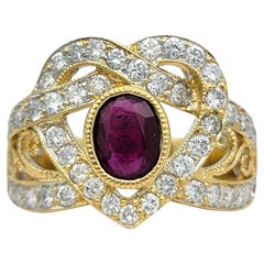 Oval Cut Ruby and Diamond Heart Motif Cocktail Ring in 18 Karat Yellow Gold
