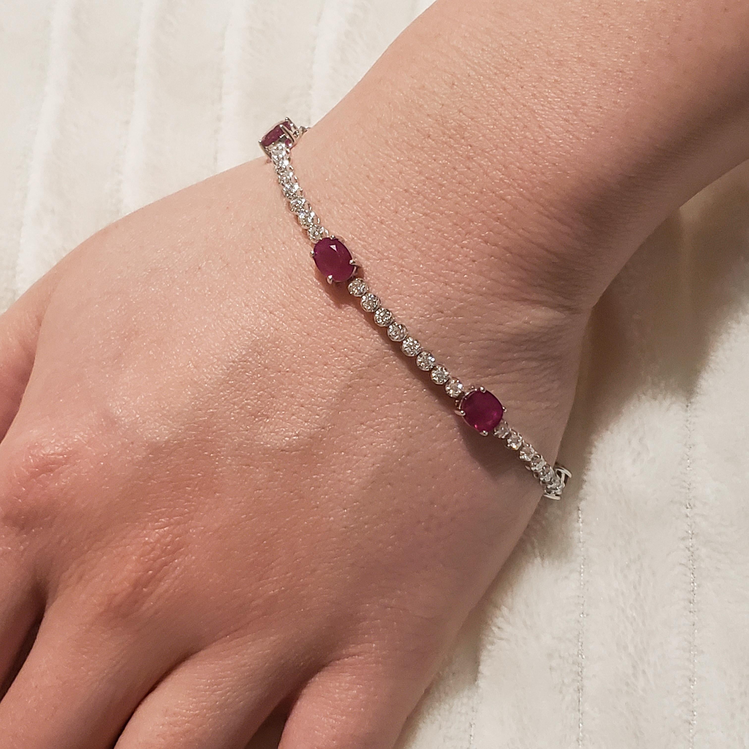 Women's Oval Cut Ruby and Diamond Tennis Bracelet For Sale