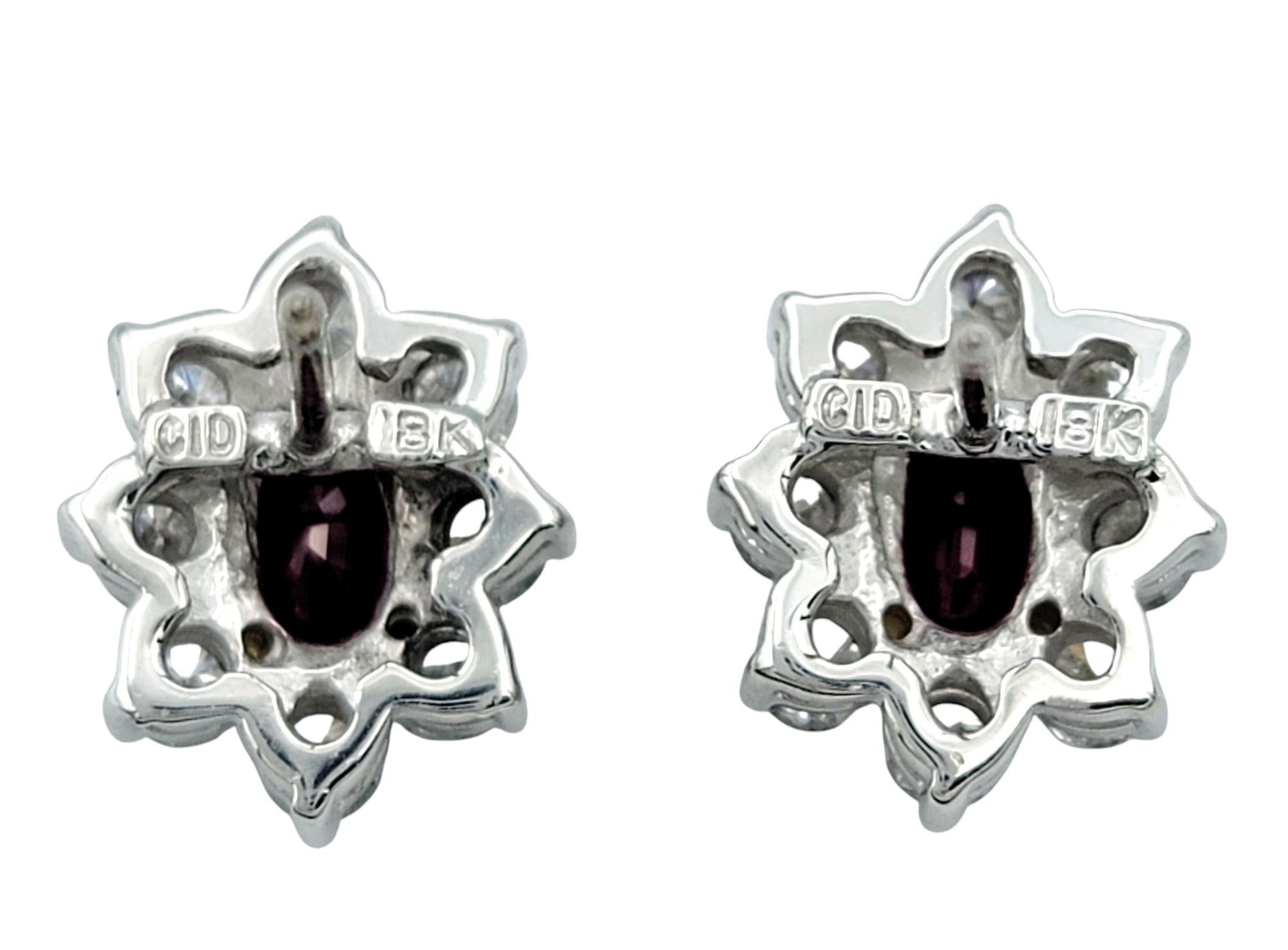 Oval Cut Ruby and Round Diamond Halo Stud Earrings in Two-Tone 18 Karat Gold For Sale 2