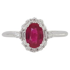 Bague de fiançailles Halo en rubis ovale, baguette et diamant rond taillé en brillant
