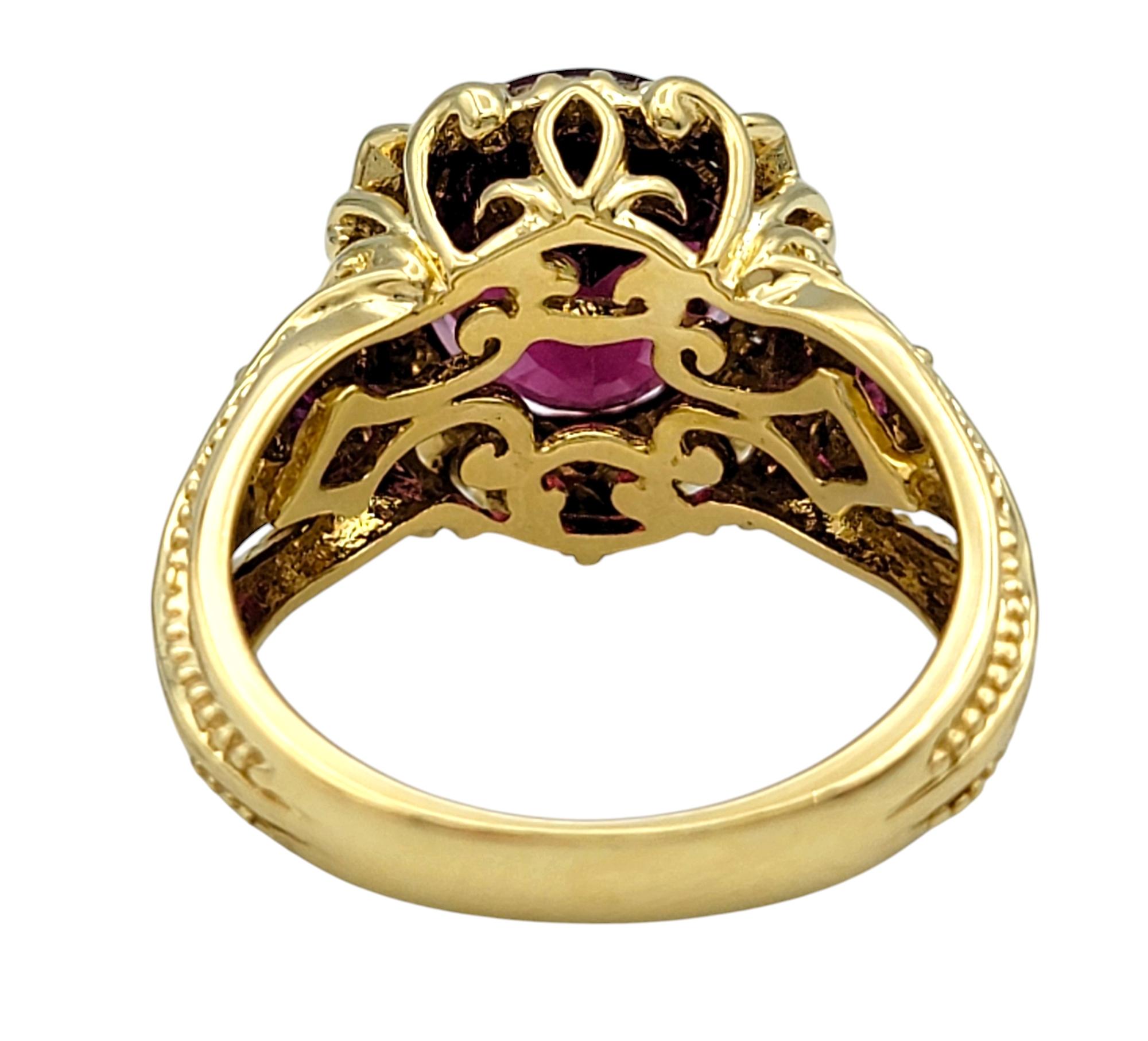Oval Cut Rubellite Tourmaline, Ruby and Diamond Halo Ring Textured 14 Karat Yellow Gold For Sale