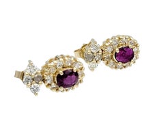 Boucles d'oreilles en or jaune 14 carats avec halo de diamants ronds de taille ovale