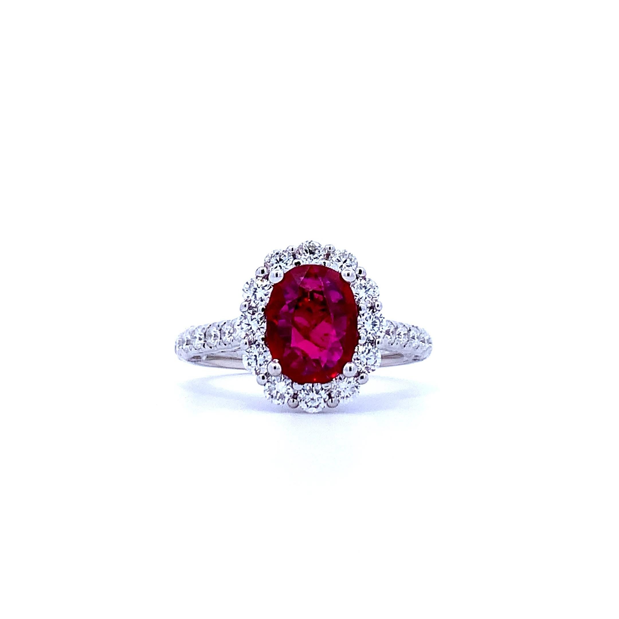 One of our newest pieces, a Ruby Halo Ring with 40 Diamonds on an 18k White Gold Ring. Ruby is African.

Oval Cut Ruby - 1.63ct
Diamonds - 1.00ct
Ring Metal - 18k White Gold