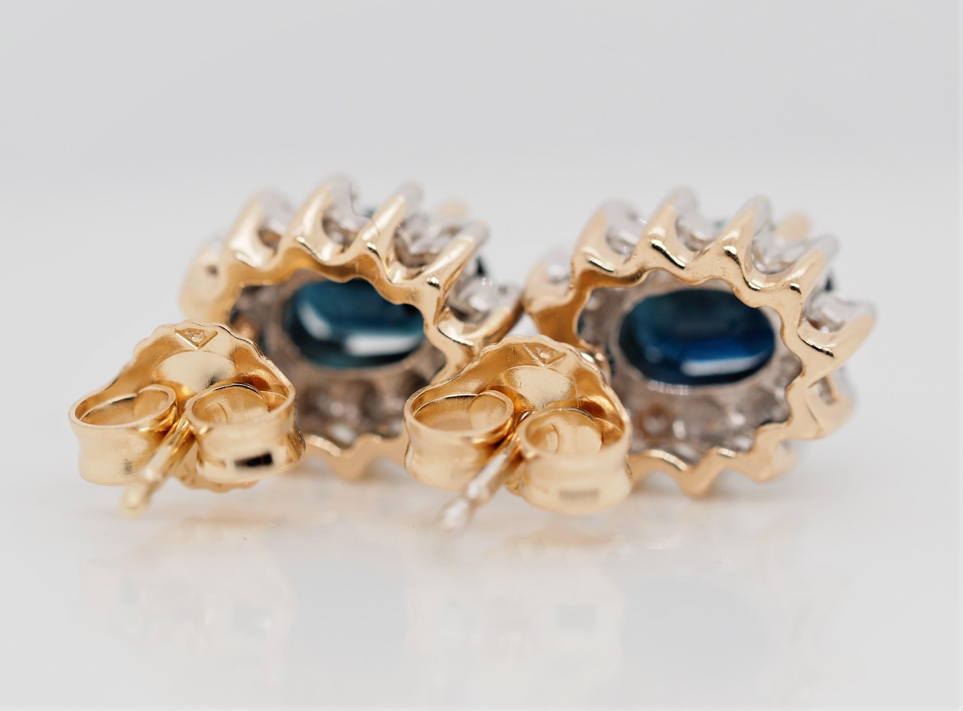 Art Deco Oval Cut Sapphire and Diamond Halo Stud Earrings of 14 Karat Two-Tone Gold