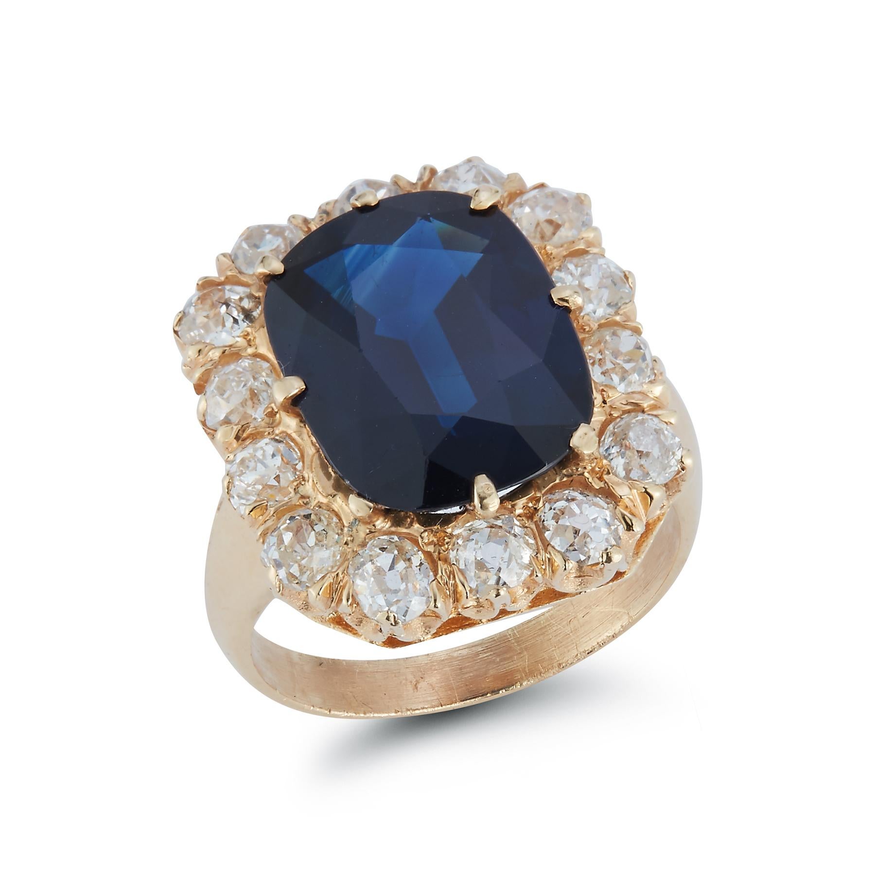 Oval Cut Sapphire & Diamond Halo Ring 

Oval Cut Sapphire 8.38 cts set in a 14k Gold ring 
Surrounded by 14 Brilliant Cut Diamonds

Ring Size 6.75
Resizable Free of Charge