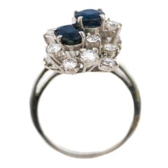 Oval Cut Sapphires and Brilliant Cut Diamonds Cluster Ring