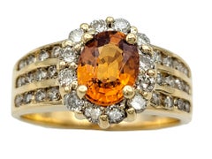 Oval Cut Spessartite Garnet and Diamond Halo Wide Band Ring 14 Karat Yellow Gold