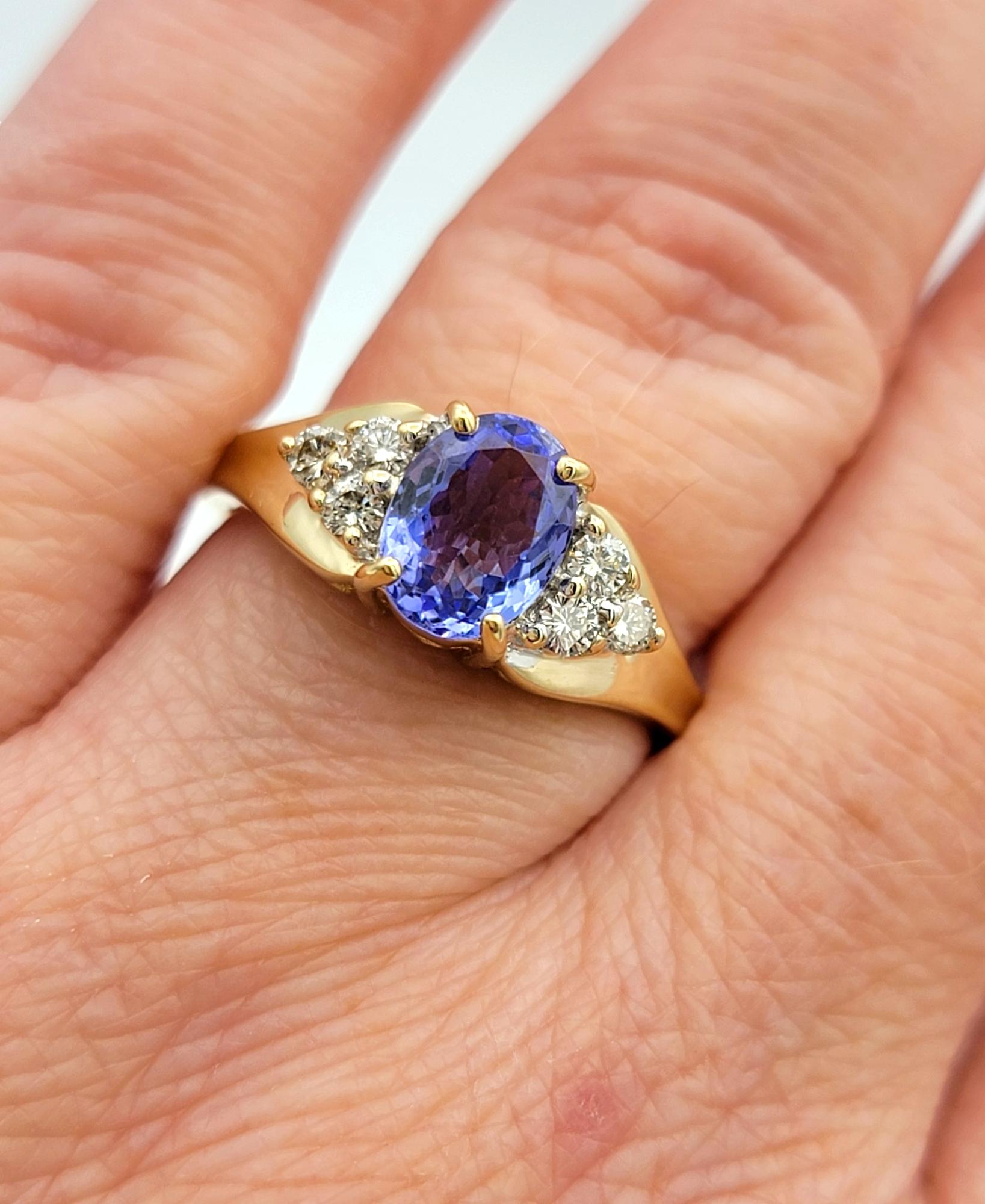 Oval Cut Tanzanite and Diamond Cluster Ring in Polished 14 Karat Yellow Gold For Sale 5