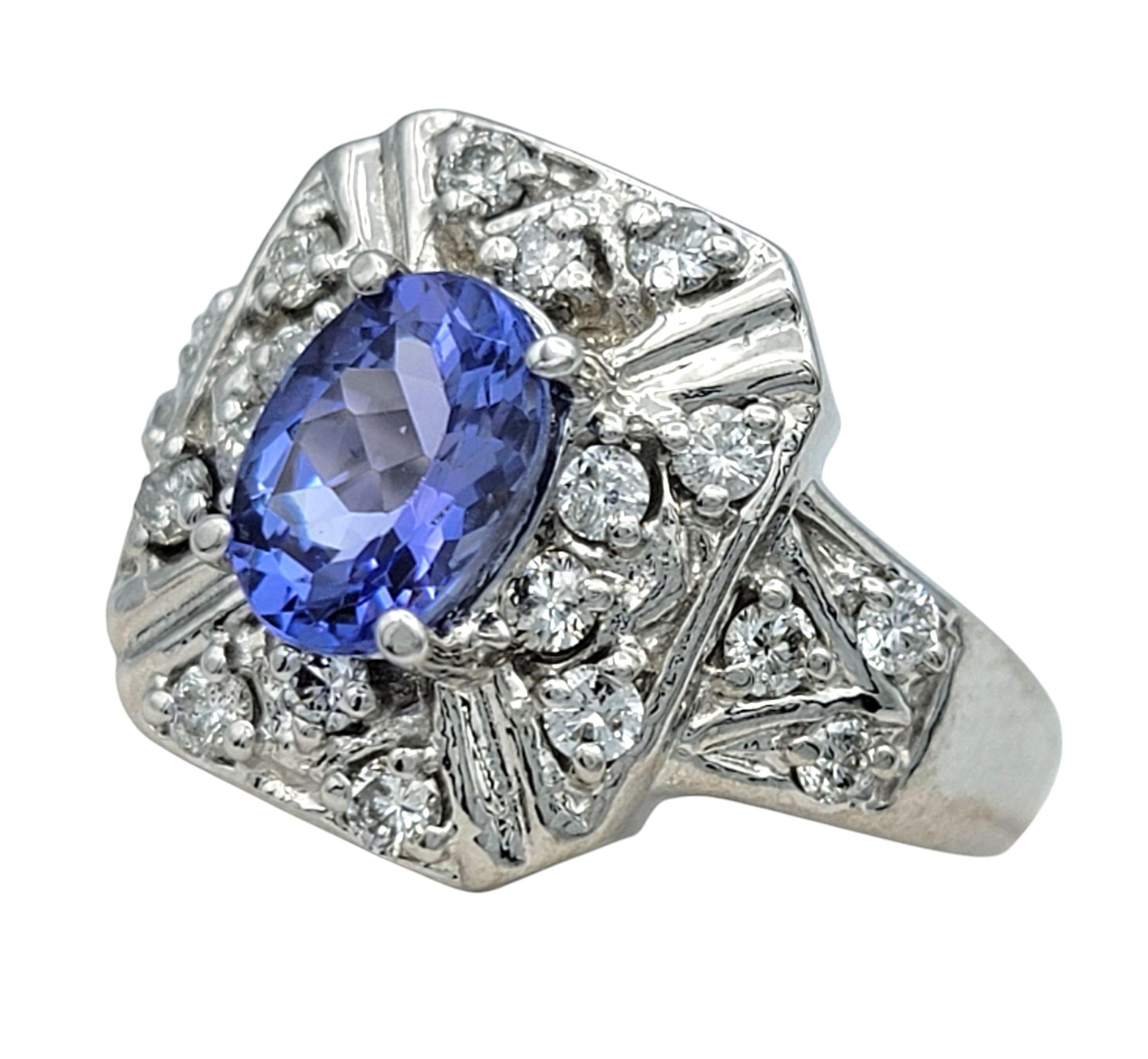 Contemporary Oval Cut Tanzanite and Round Diamond Ornate Cocktail Ring in 14 Karat White Gold For Sale