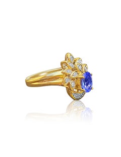 Oval-Cut Tanzanite, Diamond and 14 Karat Yellow Gold Cocktail Ring