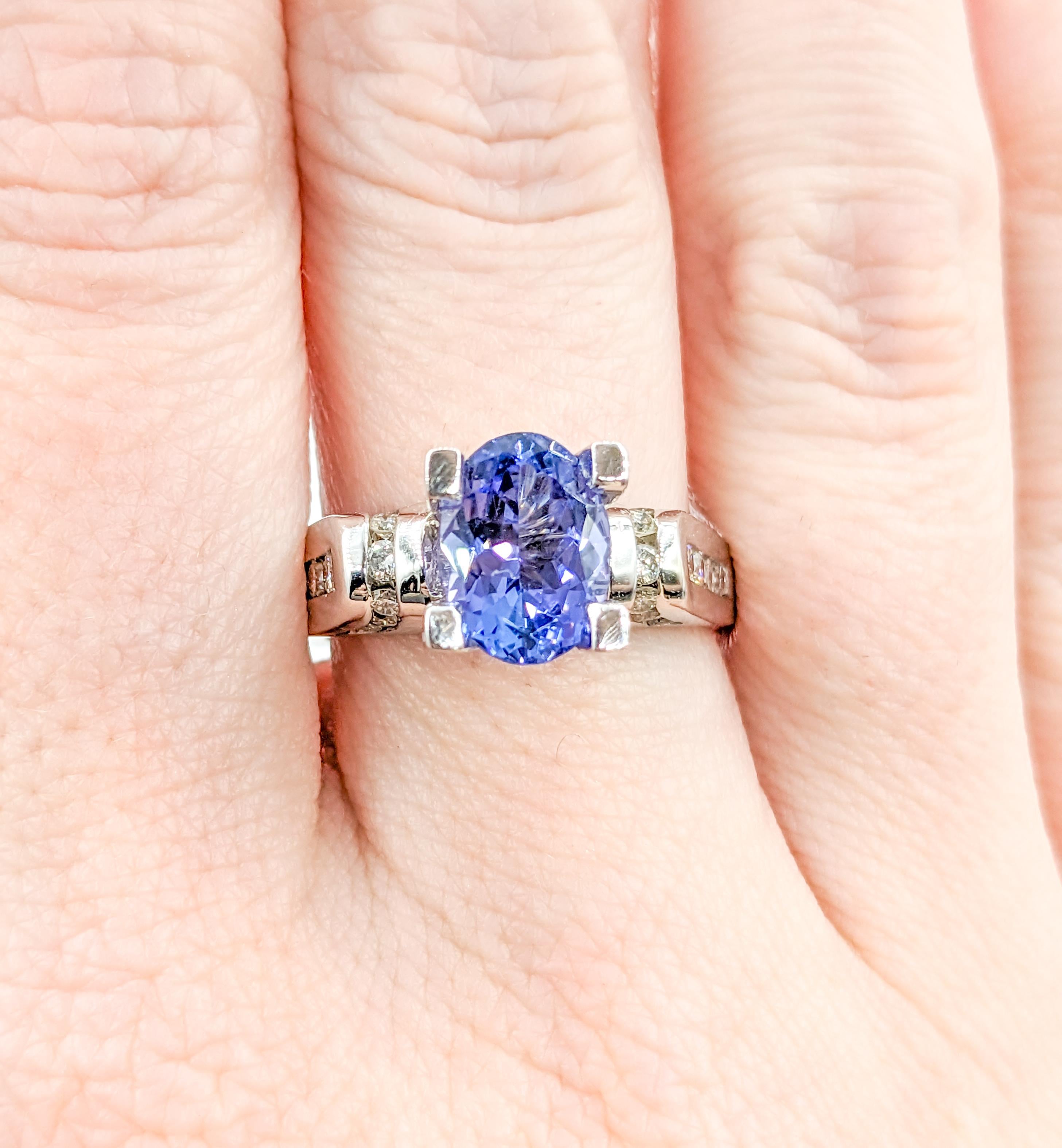 Modern Oval Cut Tanzanite & Diamond Ring in White Gold For Sale