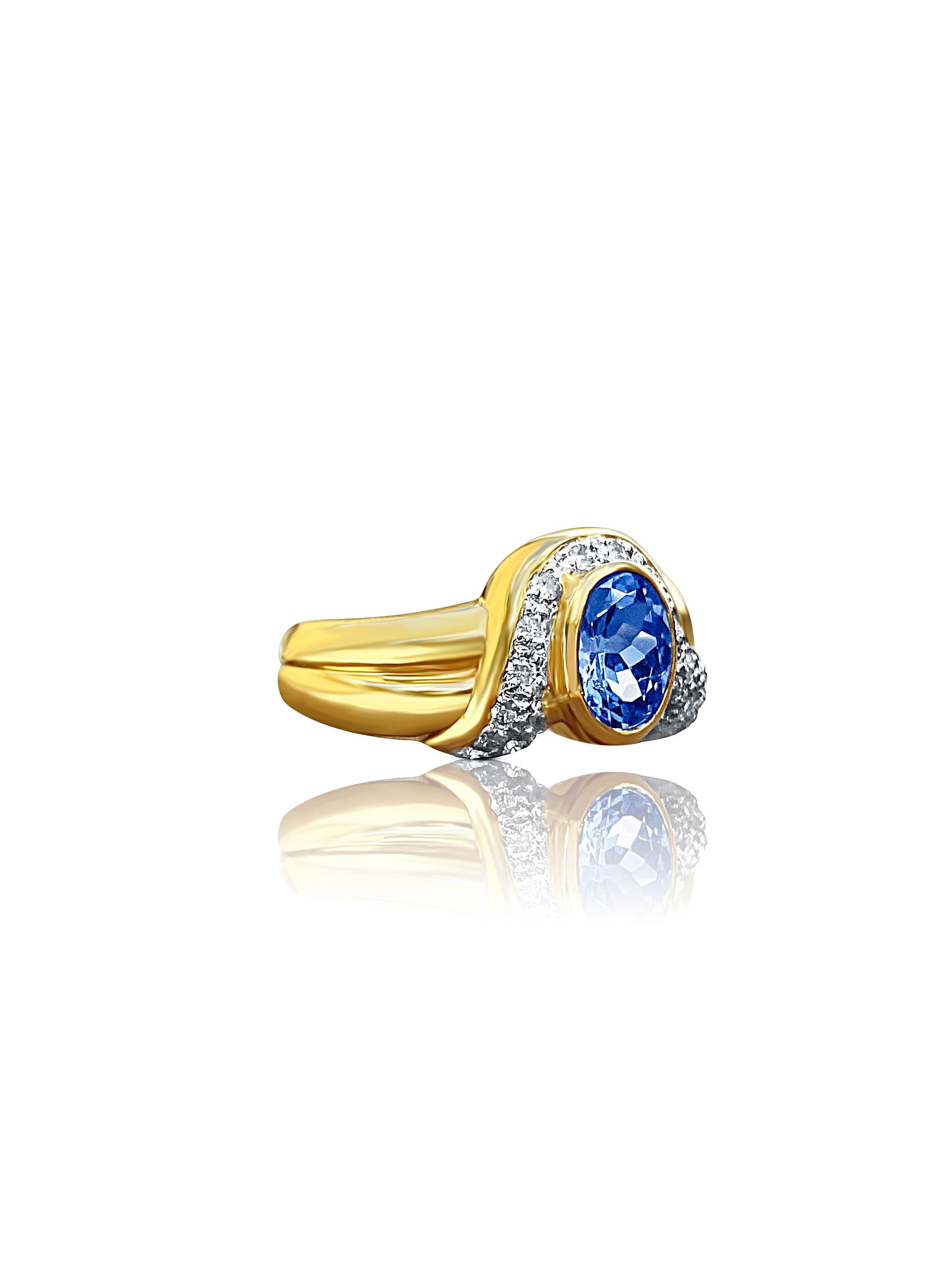 Vintage Heirloom Centering a 0.62 Carat Tanzanite, accented by Round-Brilliant Cut Diamonds, and set in 14K Yellow Gold.

Details:
✔ Stone: Tanzanite
✔ Stone Weight (Carat): 0.62 Carats
✔ Stone Cut: Oval
✔ Stone Origin: Tanzania
✔ Ring: 14K Yellow,