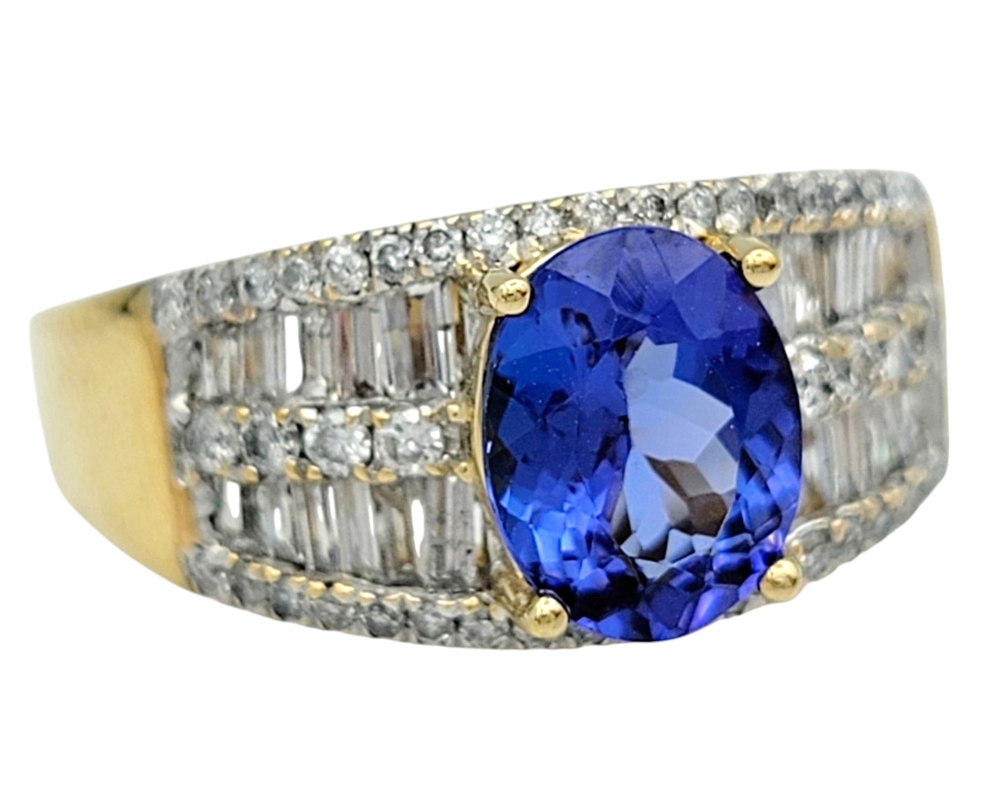 Taille de l'anneau : 7 

Fusion exquise de couleurs vibrantes et d'élégance intemporelle, cette bague en tanzanite et diamant est un véritable coup de cœur. En son centre, une époustouflante tanzanite bleue violette de taille ovale rayonne d'un