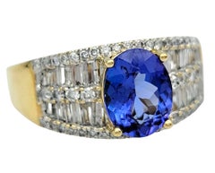 Oval Cut Tanzanite Wide Band Ring with Diamonds in Polished 18 Karat Yellow Gold