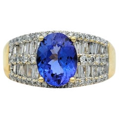 Oval Cut Tanzanite Wide Band Ring with Diamonds in Polished 18 Karat Yellow Gold