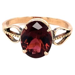 Bague en or jaune 14 carats avec tourmaline de taille ovale