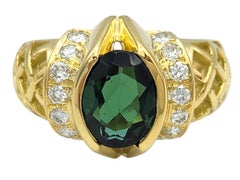 Oval Cut Tourmaline and Diamond Lattice Detail Band Ring in 18 Karat Yellow Gold