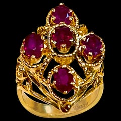 Oval Cut Treated Rubies 5 Ct 14 Karat Yellow Gold Flower Cocktail Ring