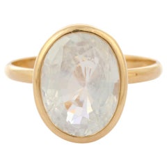 Oval Cut White Sapphire Cocktail Ring in 18K Yellow Gold
