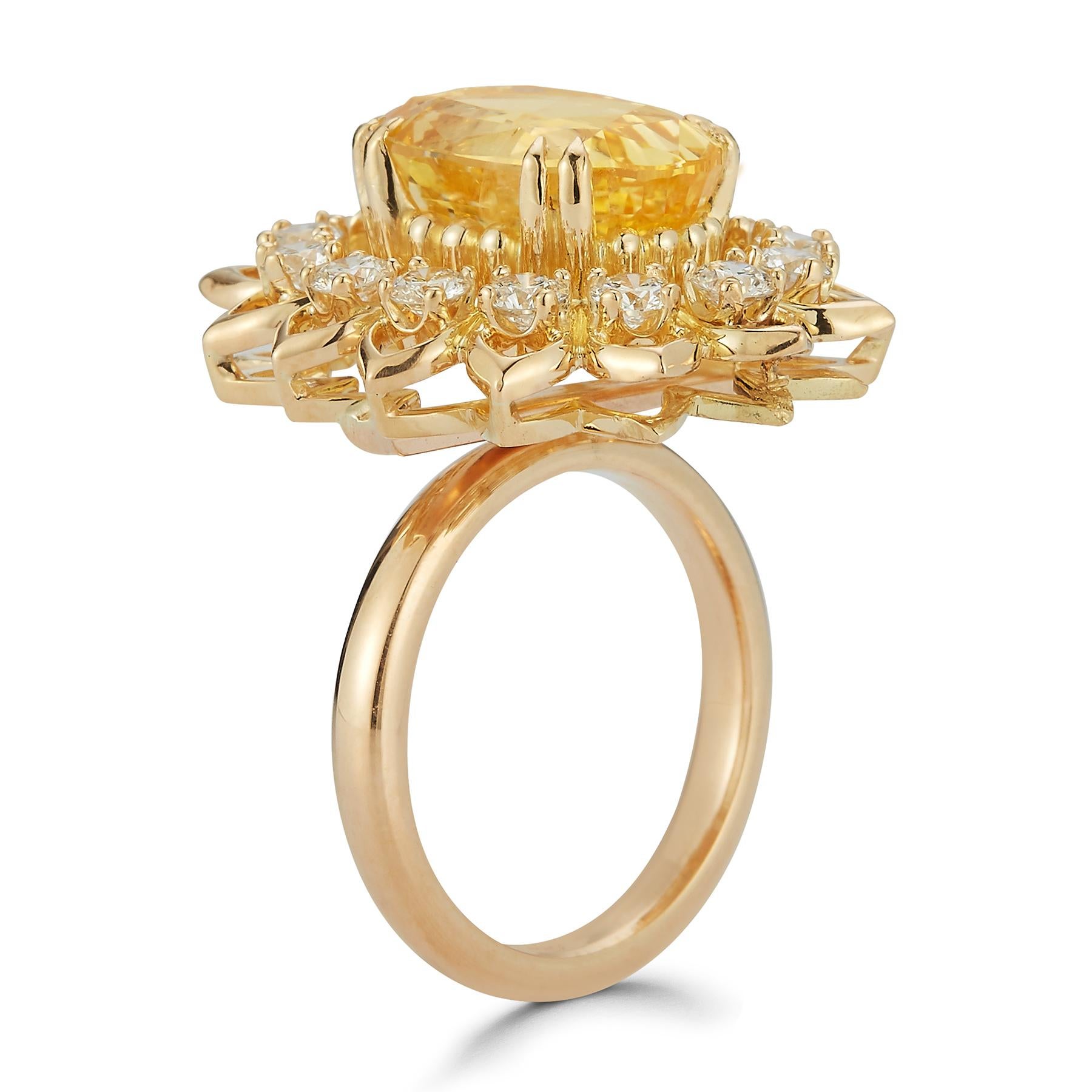 Oval Cut Yellow Sapphire & Diamond Flower Cocktail Ring

This luminous ring showcases a mesmerizing large oval-cut yellow sapphire, radiating a warm golden hue evocative of the sun. The central gemstone is beautifully complemented by a halo of 14
