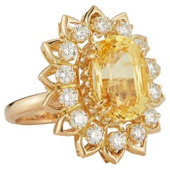 Bague cocktail fleur en saphir jaune taillé en ovale et diamant