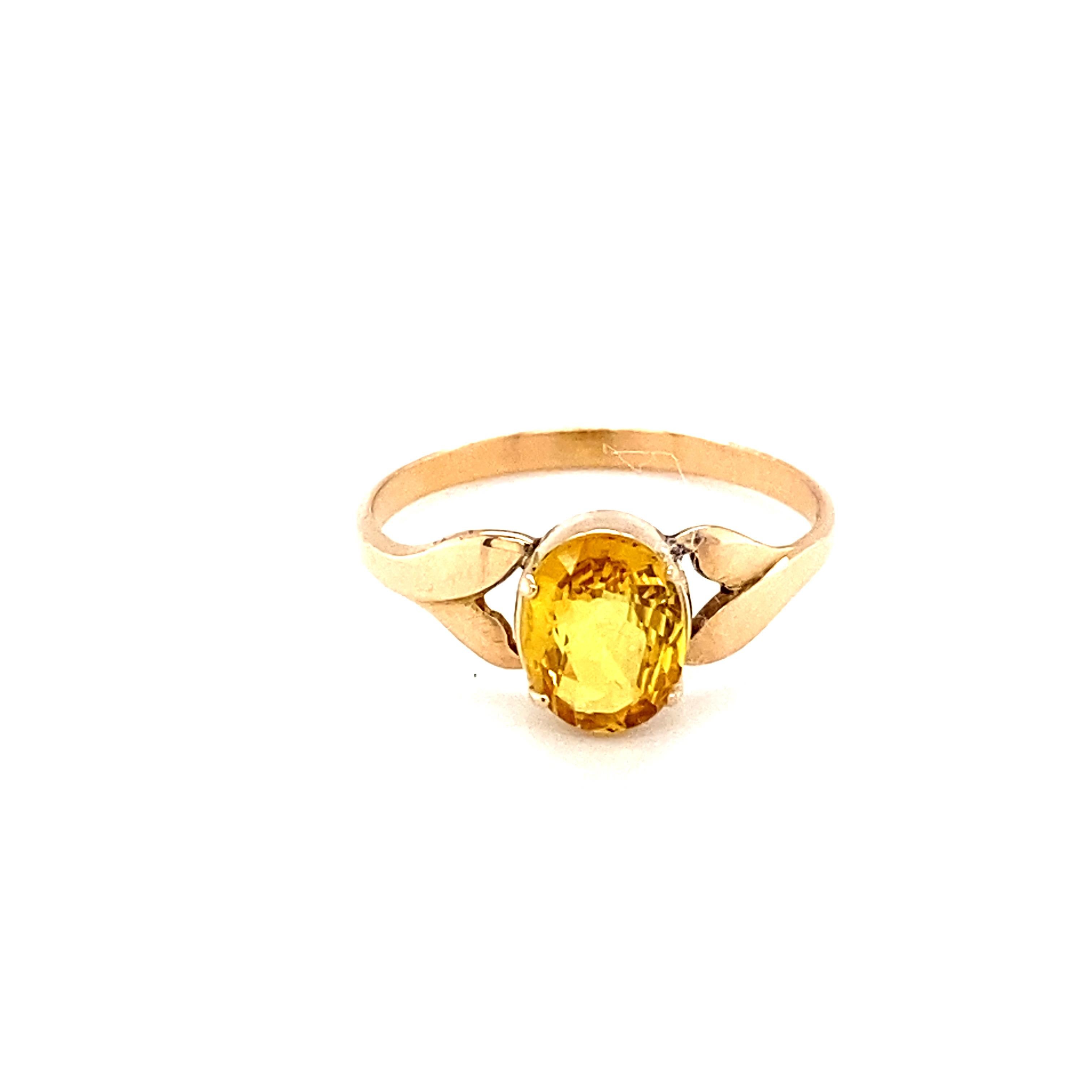 Oval cut yellow sapphire is mounted in 14K yellow gold. Beautifully hand crafted ring in double twisted design is suitable for your everyday companion. Carefully chosen gem stone is hand cut and polished. One of a kind ring to suit your style. Its