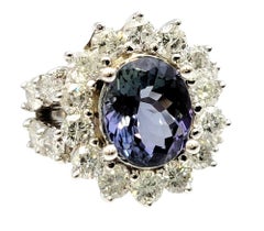 Oval Cut Zoisite and Diamond Halo Split Shank Ring in 14 Karat White Gold