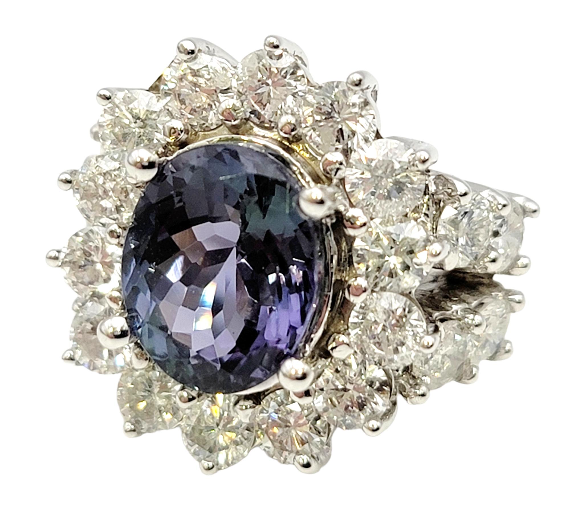 Contemporary Oval Cut Zoisite and Diamond Halo Split Shank Ring in 14 Karat White Gold For Sale