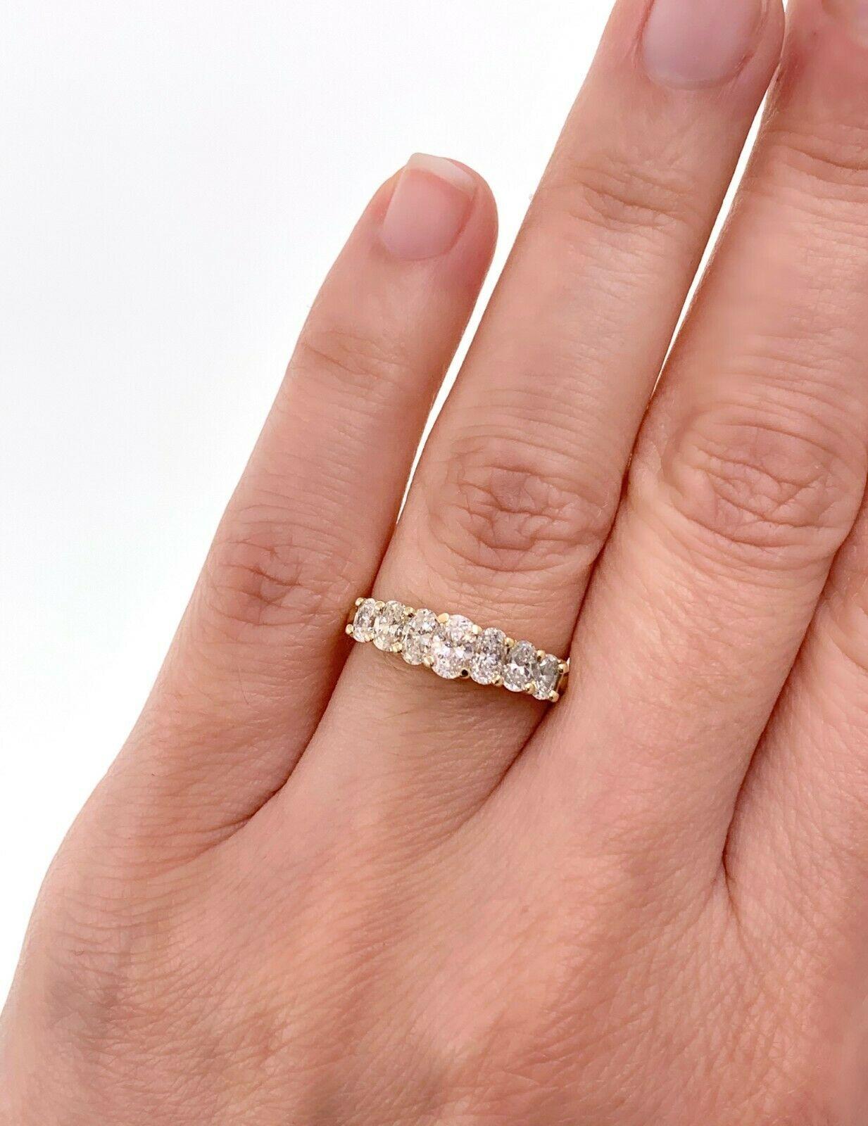 Oval Brilliant Diamond Ring
Style: 7-Diamond Graduated Diamond Band
Metal:  14K Yellow Gold
Size / Measurements:  5.5, sizable
TCW:  1.00 carats total approximate
Diamonds:  7 Oval Cut Diamonds
Color & Clarity:  H - I Color,  VS2 - SI1