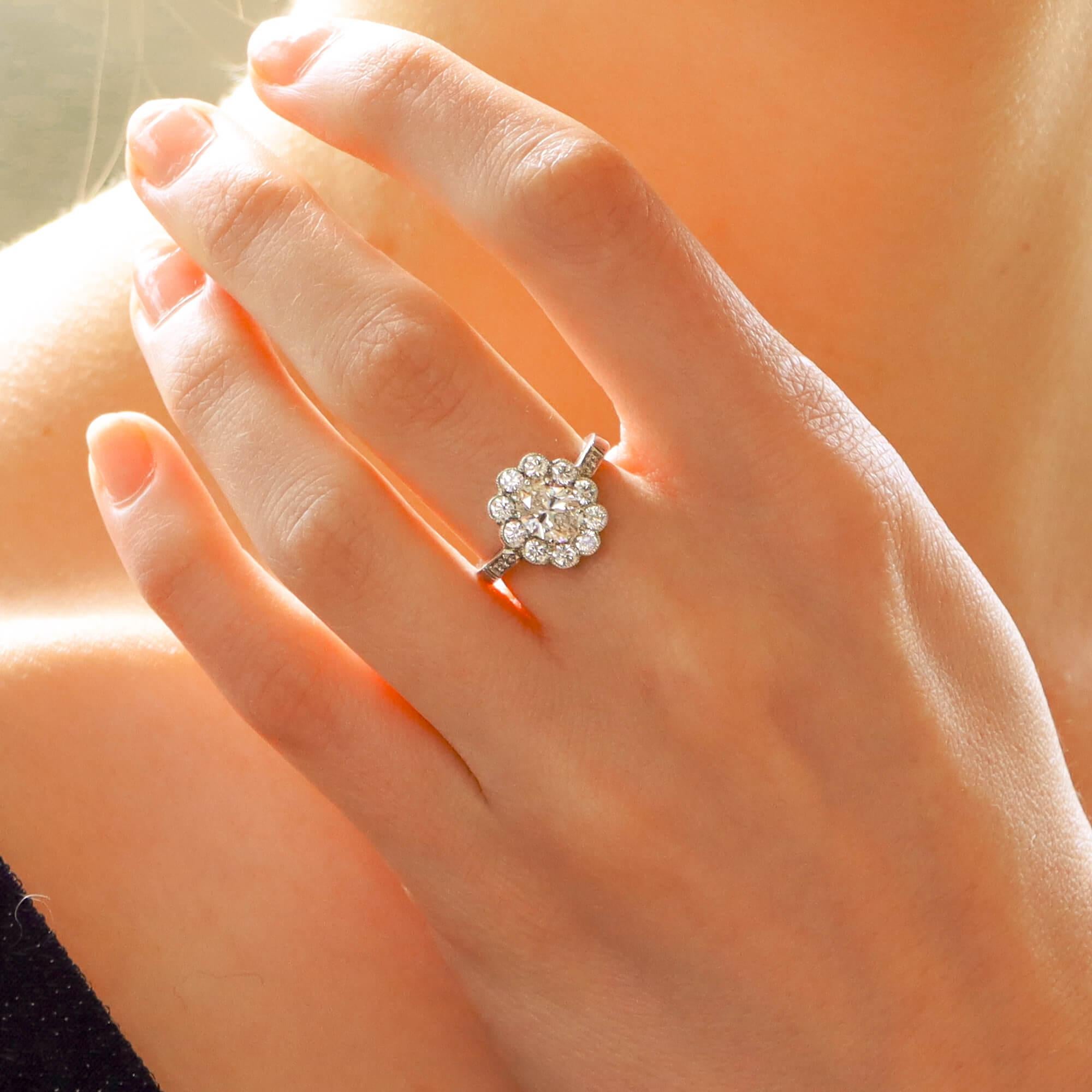 Modern Oval Diamond Cluster Halo Engagement Ring Set in Platinum