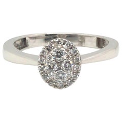 Oval Diamond Cocktail Ring with 14 Karat Gold