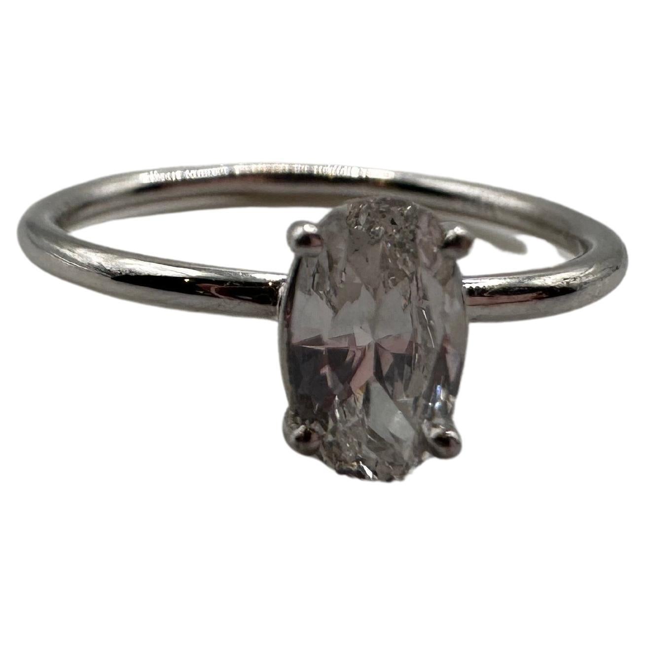 Minimalist diamond ring with a single 0.50ct oval diamond, SI1 clarity and F color, stunning diamond with lots of sparkle!

Certificate of authenticity comes with purchase!

ABOUT US
We are a family-owned business. Our studio in located in the heart